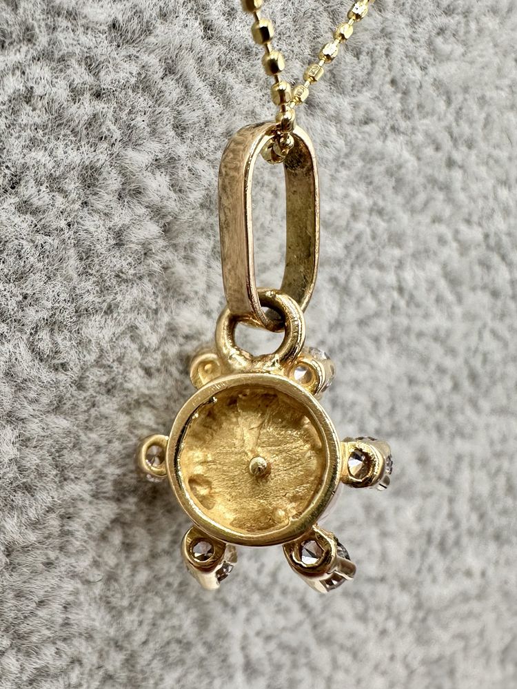Złota zawieszka 750 z perłą i diamentami 0,30ct VS1-Si1/F