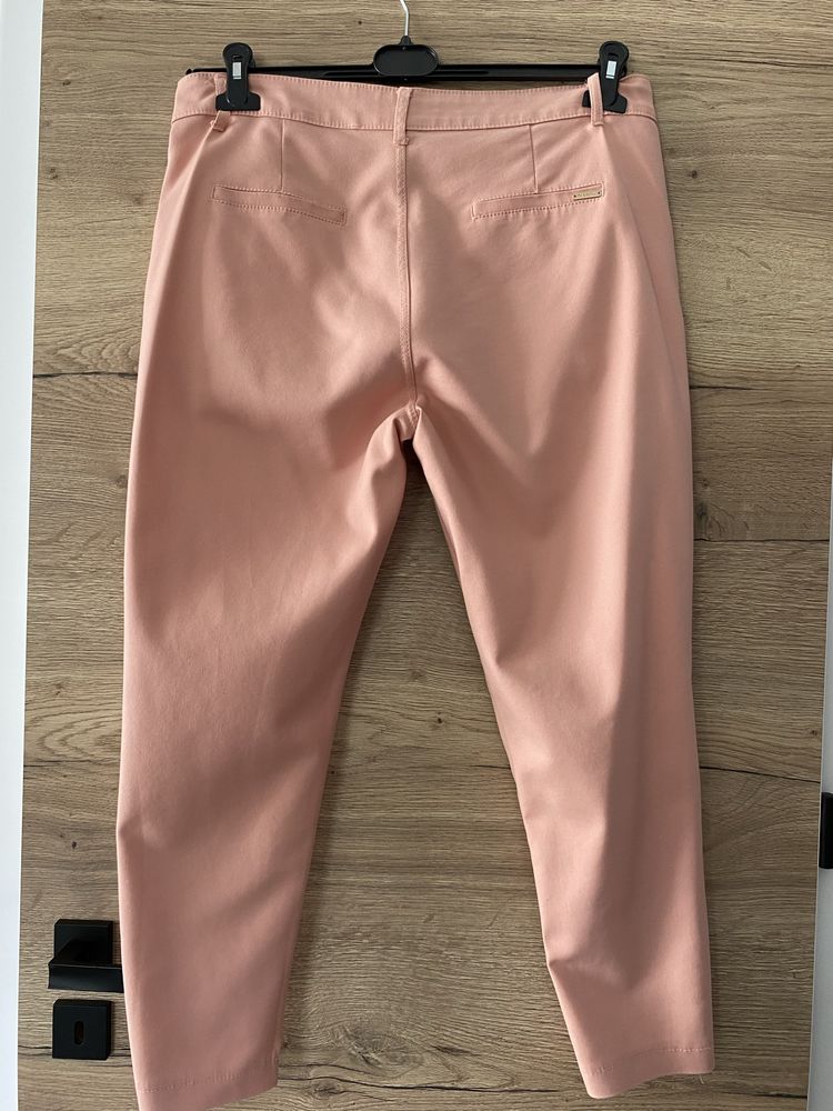 Spodnie kolor różowy/łososiowy r. około 44-46