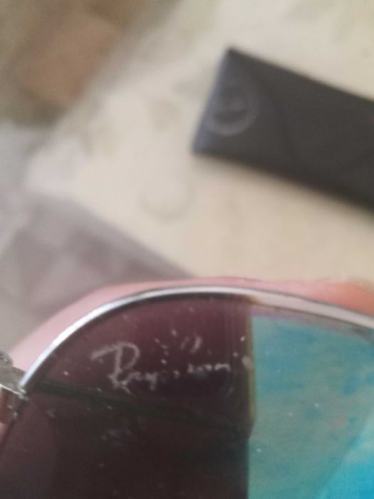 Óculos RayBan espelhados cinzentos