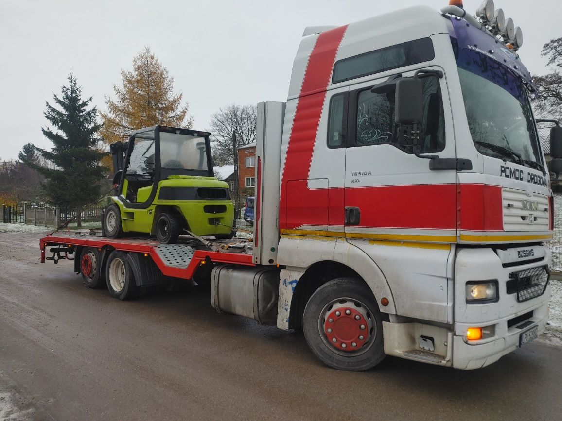Transport maszyn budowlanych rolniczych koparki ciężarowe usługi HDS