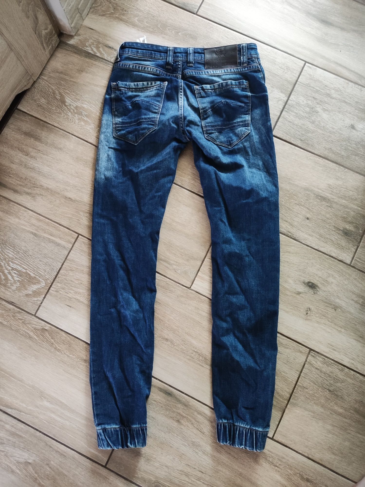 Spodnie męskie jeansowe slim fit rozmiar 31/34