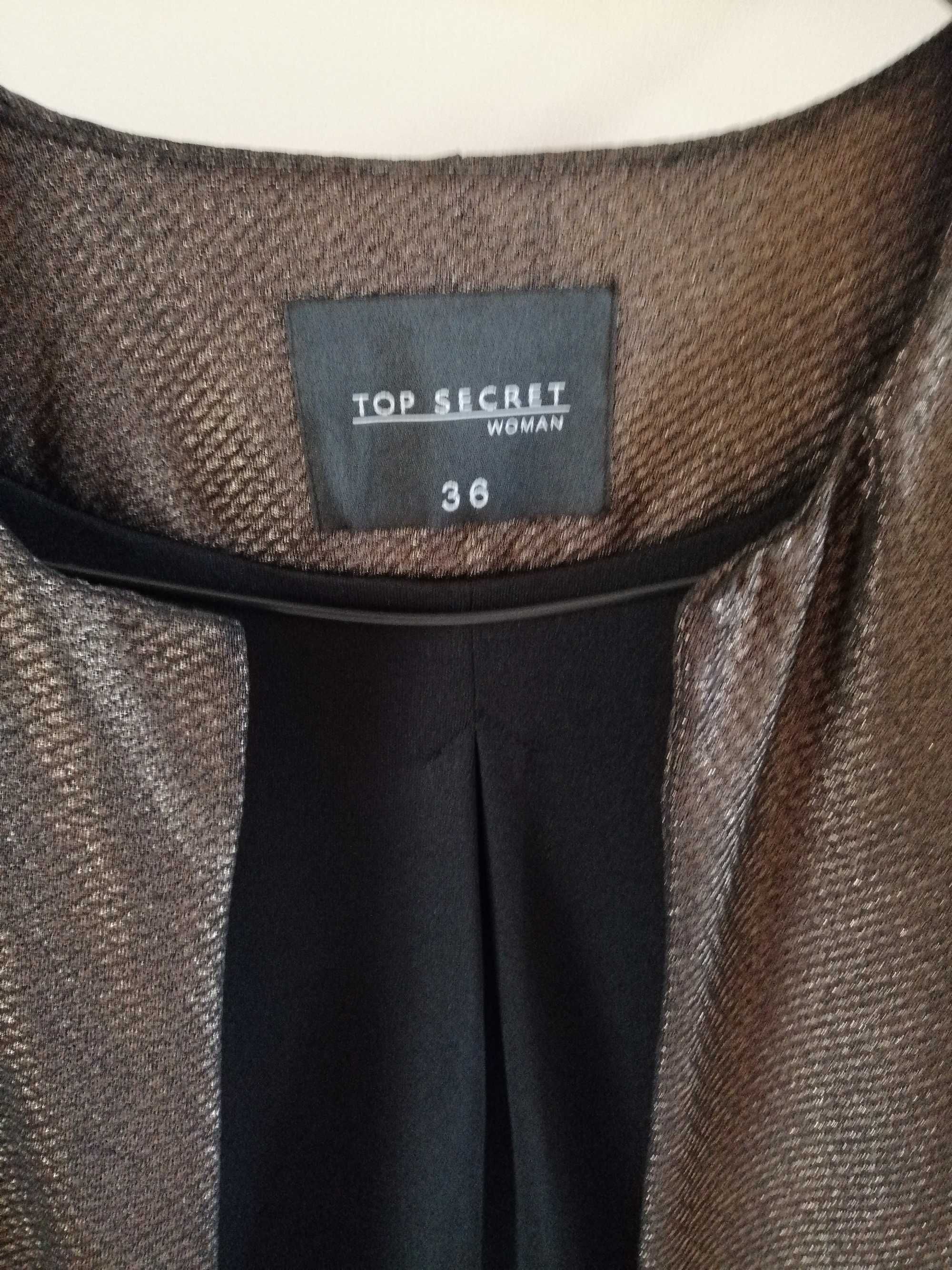 Elegancka, krótka, elastyczna marynarka, połyskująca nitka, rękaw 3/4