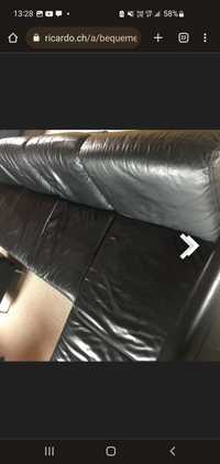 Czarna skóra sofa i pufa