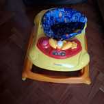 Baby walker with play station