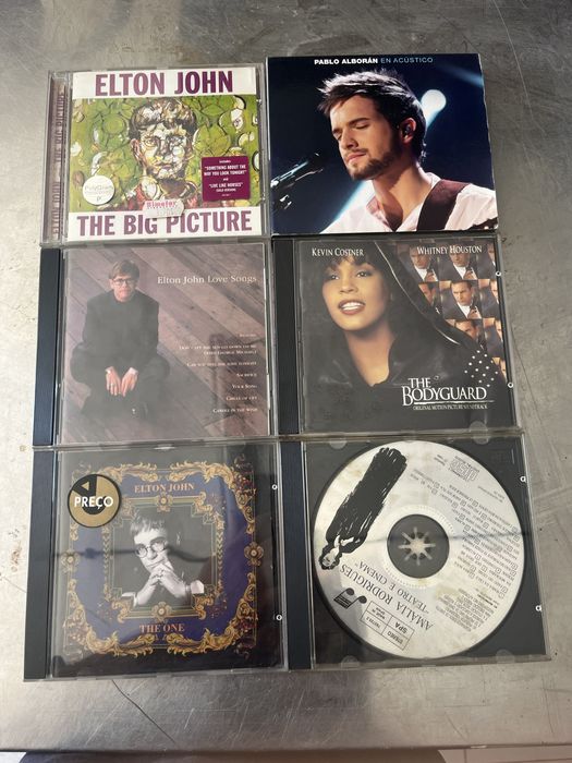 Cd e filmes vhs antigos