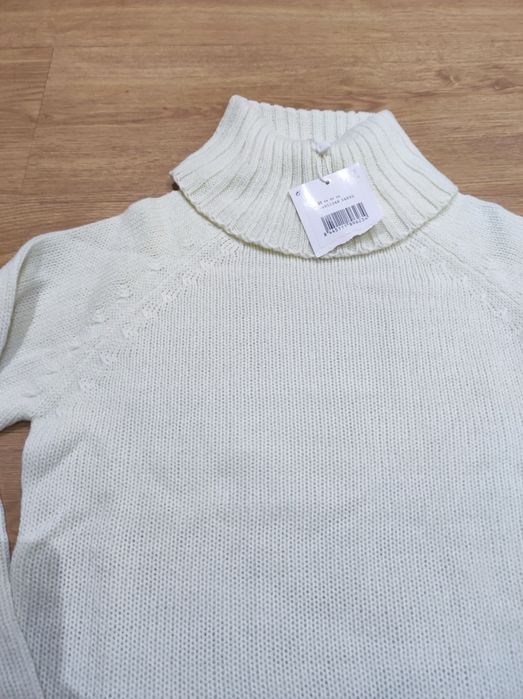 Blusa de malha gola alta