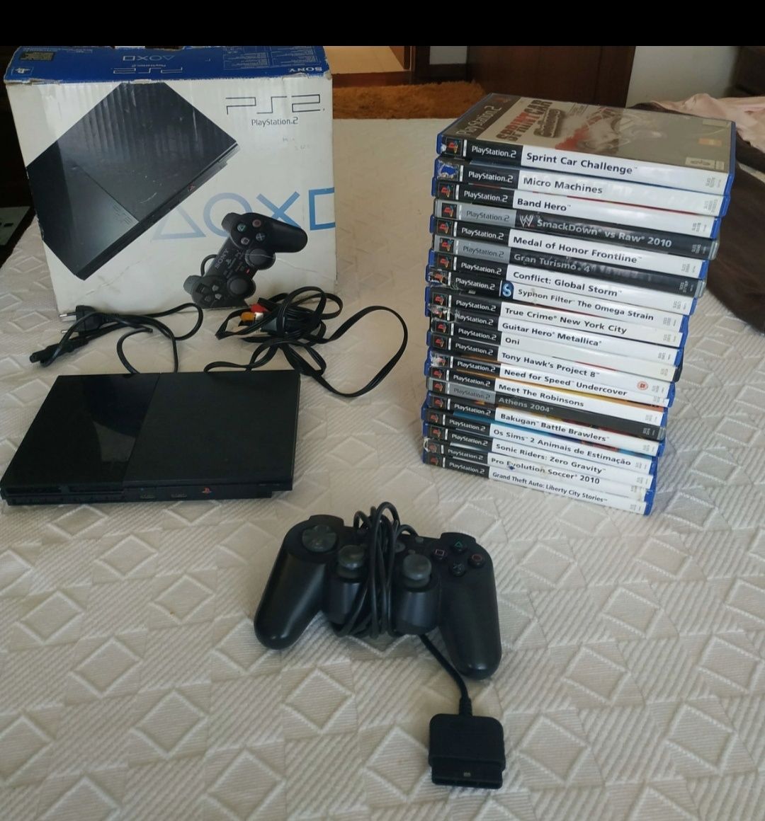 Playstation 2 na caixa + jogos