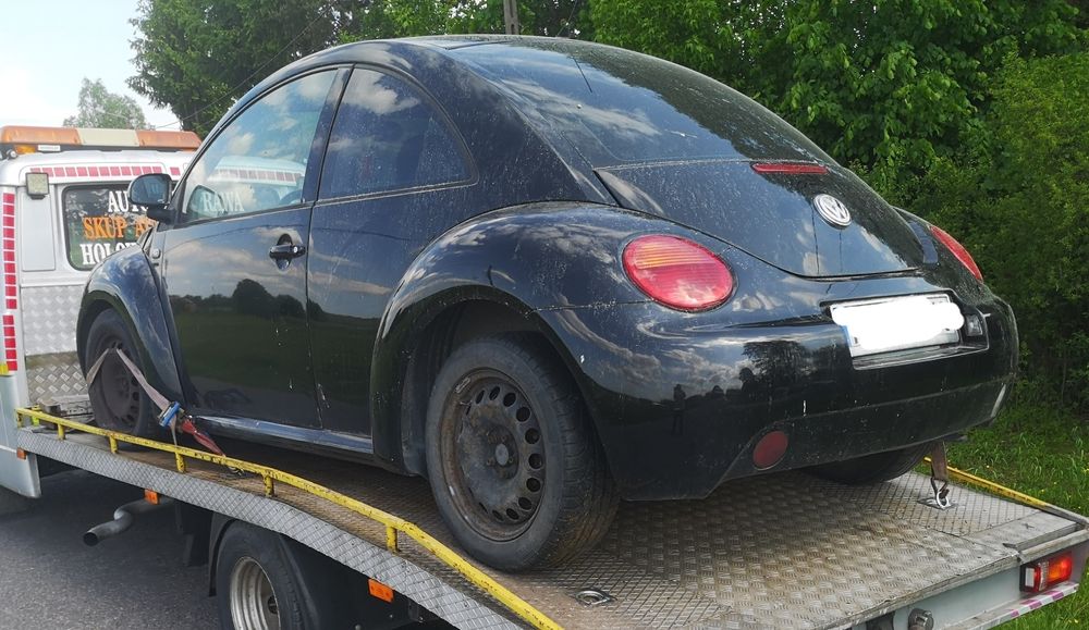 VW New Beetle części od a-z mocowanie okular lampy prawy przód  orygin