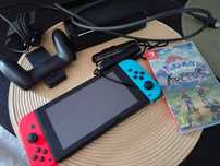 Konsola Nintendo Świętych + gra