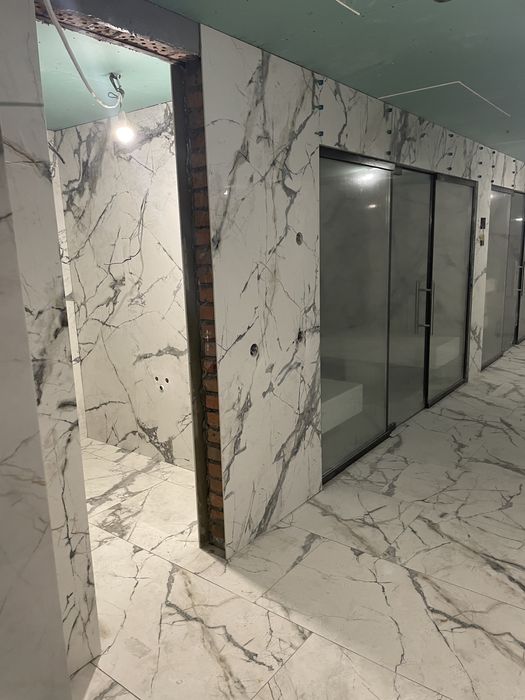 Облицювання плиткою та інші будівельні роботи