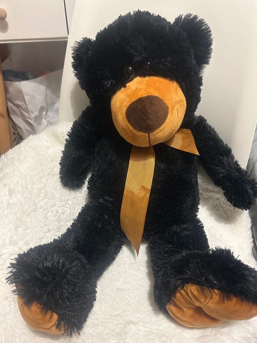 Czarny pluszowy miś