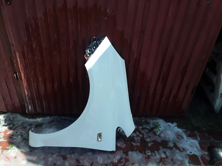 Błotnik lewy prawy przód opel corsa d 474