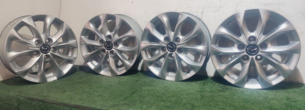 Felgi aluminiowe OE Mazda 3 5 6 CX3 CX5 5x114.3 16" 6.5J et50