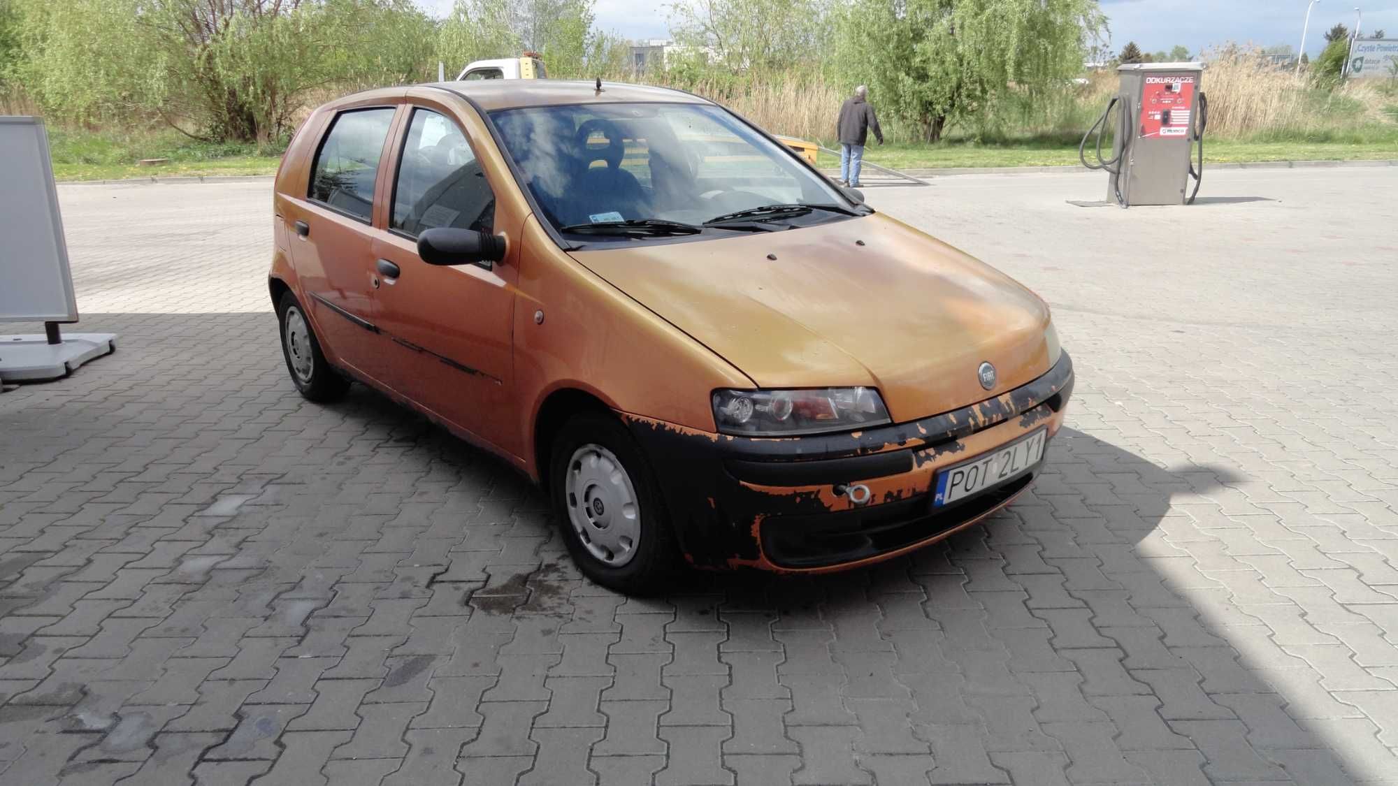 Błotnik lewy Fiat Punto pomarańczowy kolor 571