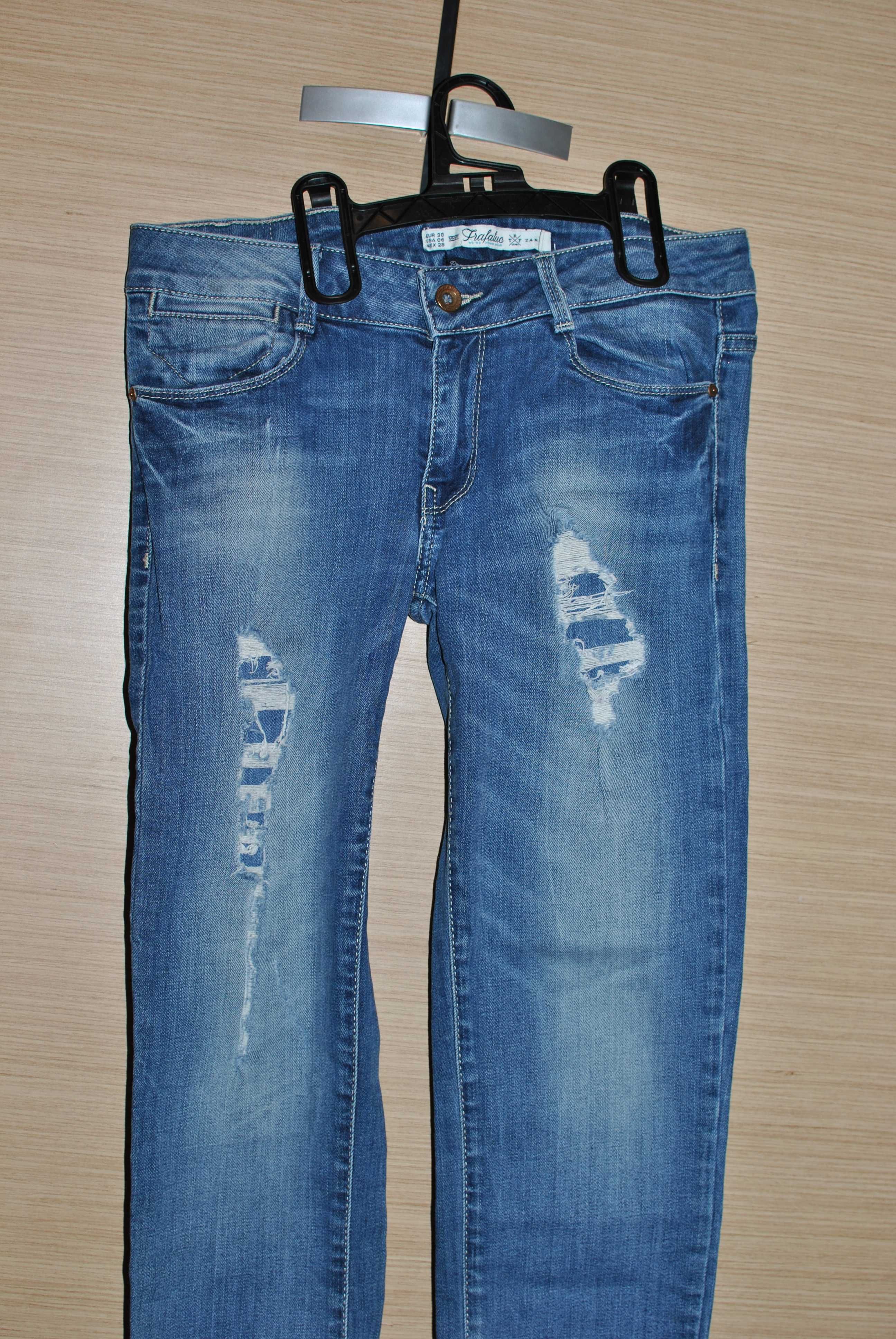 Zara spodnie jeansy z przetarciami 38 M