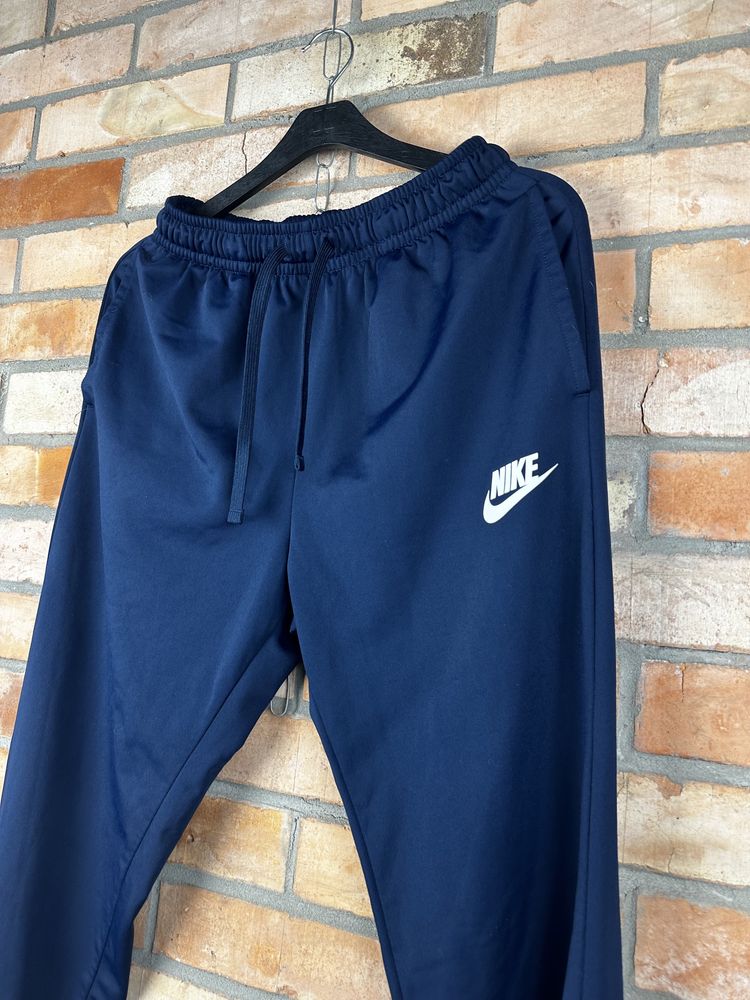 Синие штаны Nike