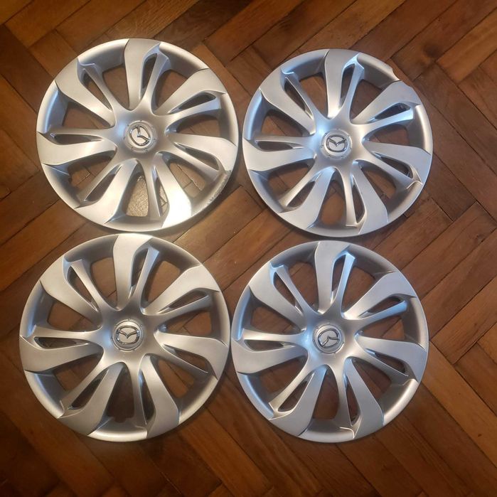 Ковпаки оригінальні на диски R15 Mazda 4шт.