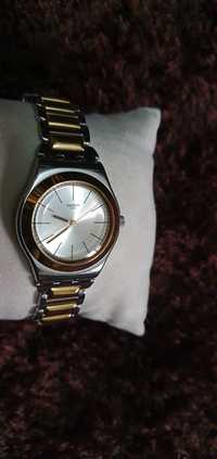 Relógio Swatch Dourado e Prateado