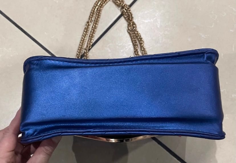 Mala azul metalizada ysl