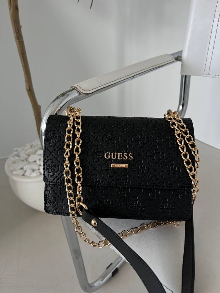 Guess heart black logo