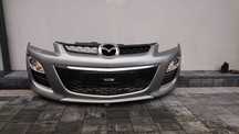 Mazda CX7 zderzak przód przedni Lift Xenon
