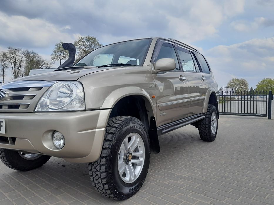 Suzuki grand vitara xl7 progi stalowe z orurowaniem bocznym