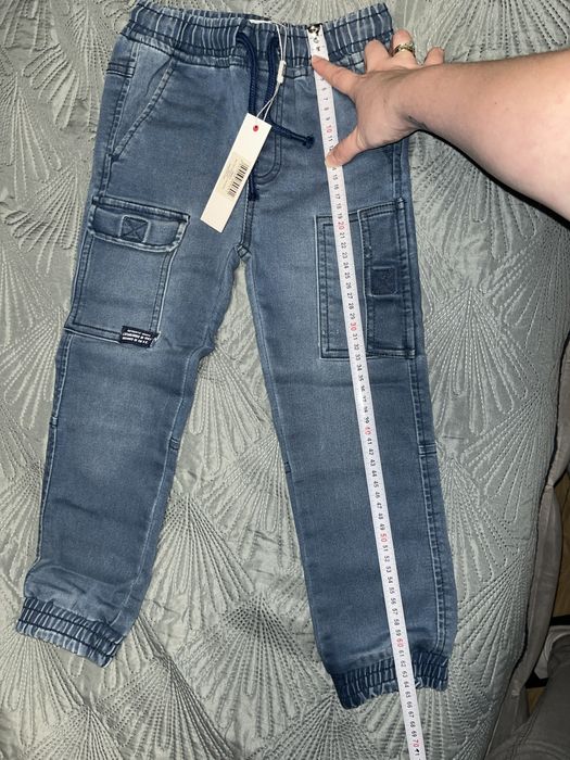 Nowe spodnie jeansowe dla chłopca 110/116