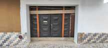 Portão de garagem em madeira