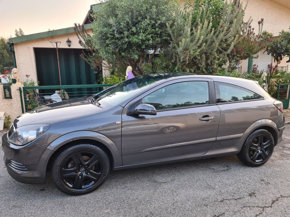 Opel astra 1.7 gtc teto panorâmico