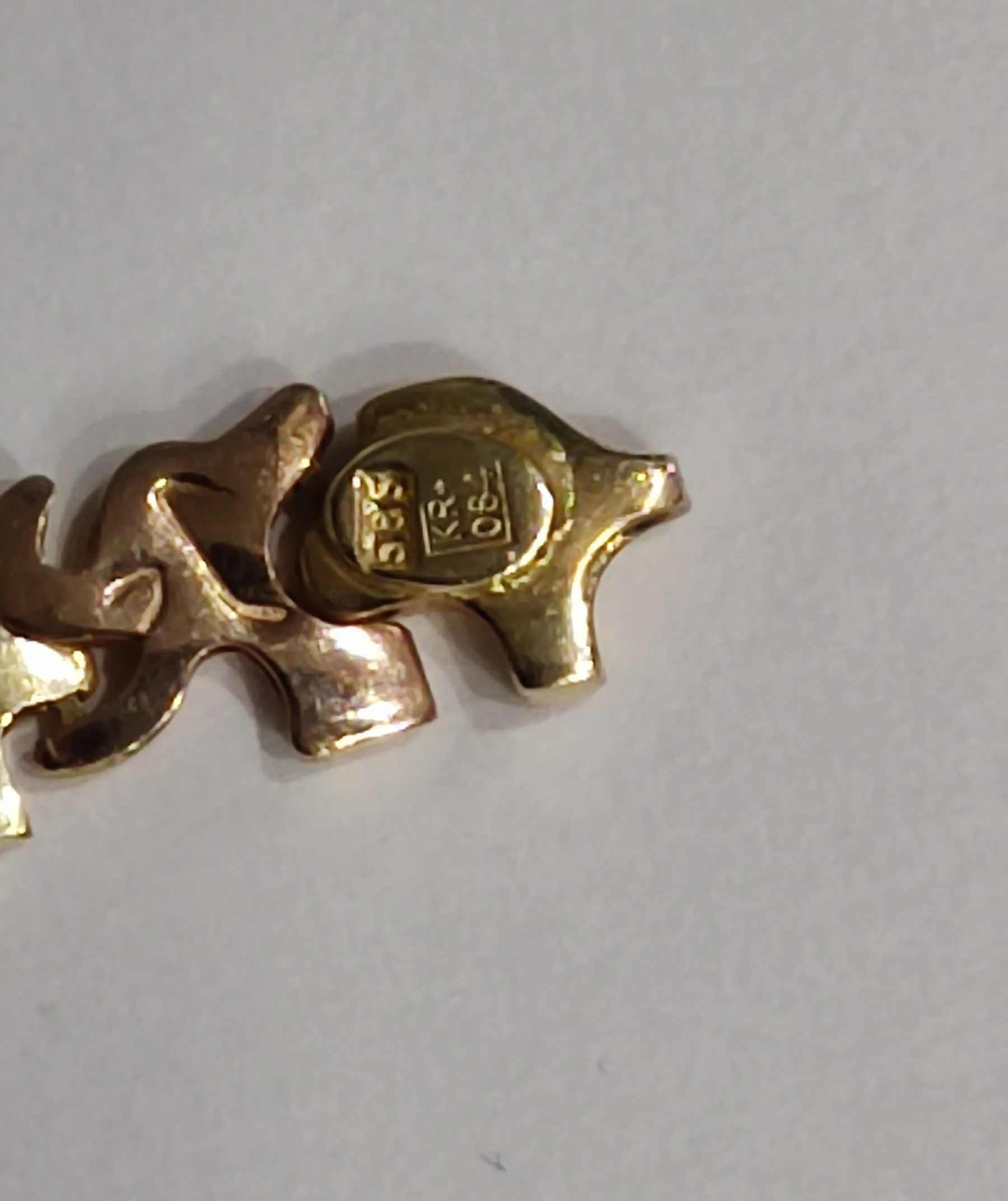Złota bransoletka, wzór słonie. Próba złota 585, waga 8,95gr.