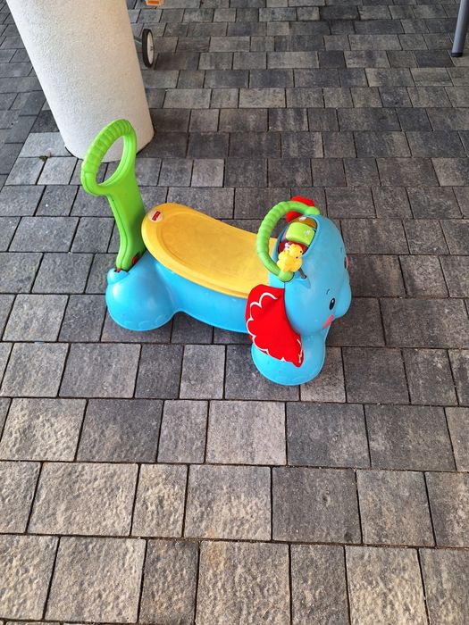 Jeździć,chodzik dzieciecy Fisher price