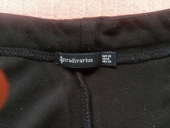 Calças/culottes pretas da Stradivarius T. 38 (medidas no anúncio)