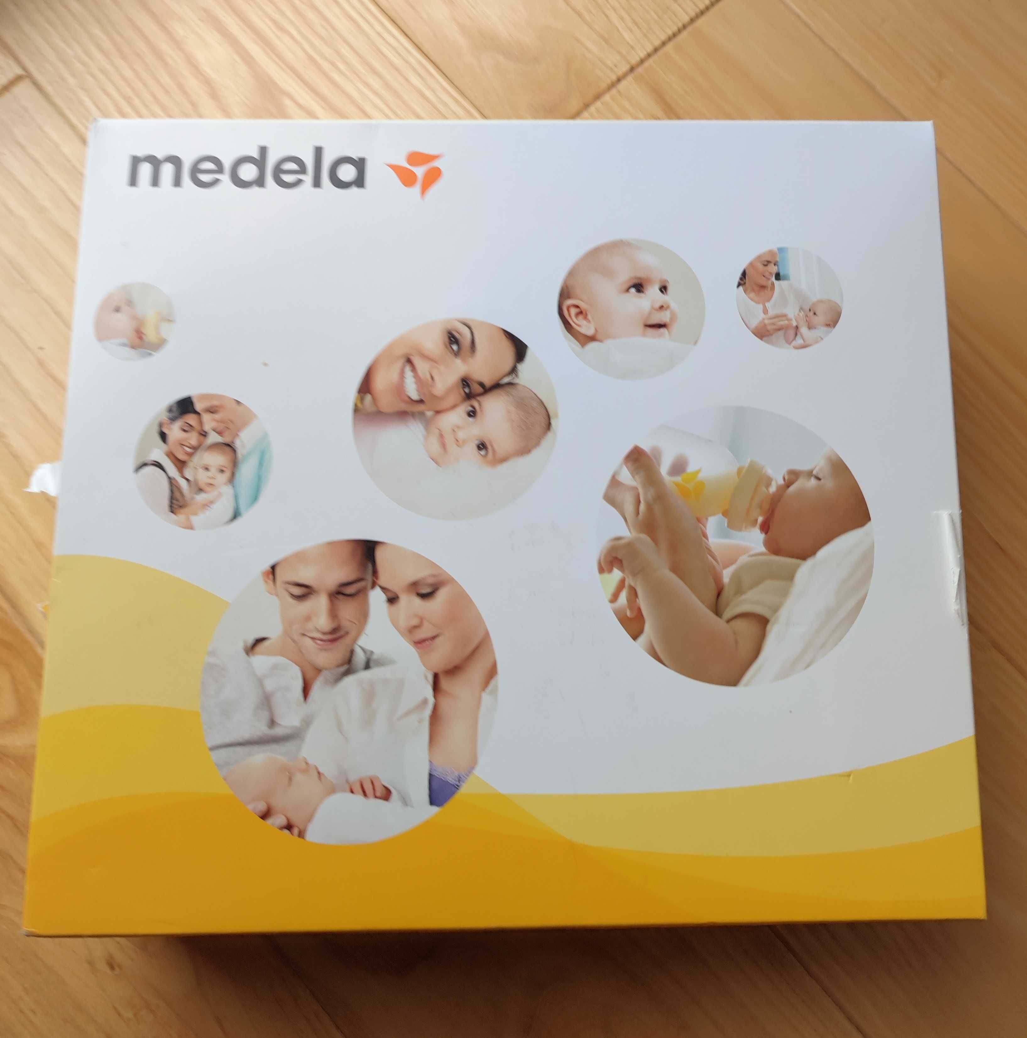 Laktator medela/ podgrzewacz tommee tippee