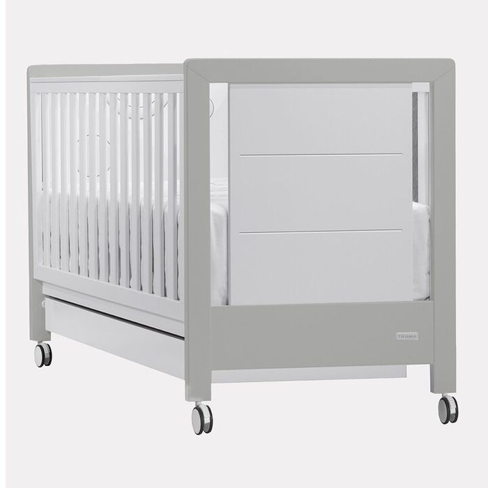 Berço para bébé com grade deslizante