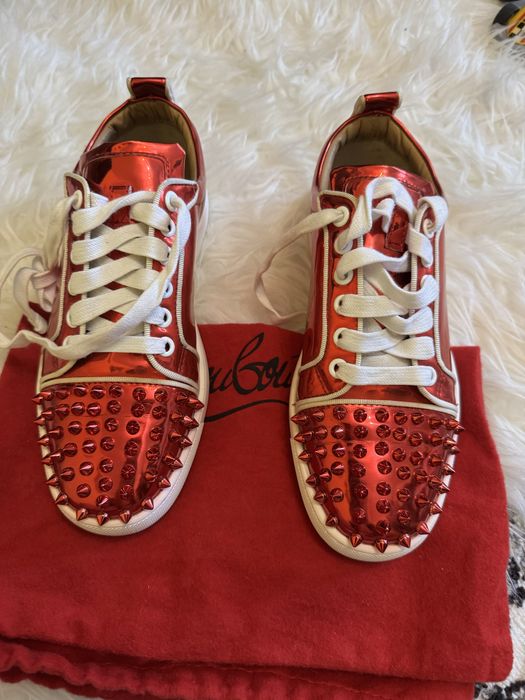 Christian louboutin червоні кросівки металік