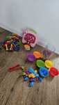 Zestaw zabawek, świnka skarbonka fisher price sorter dinozaury klocki