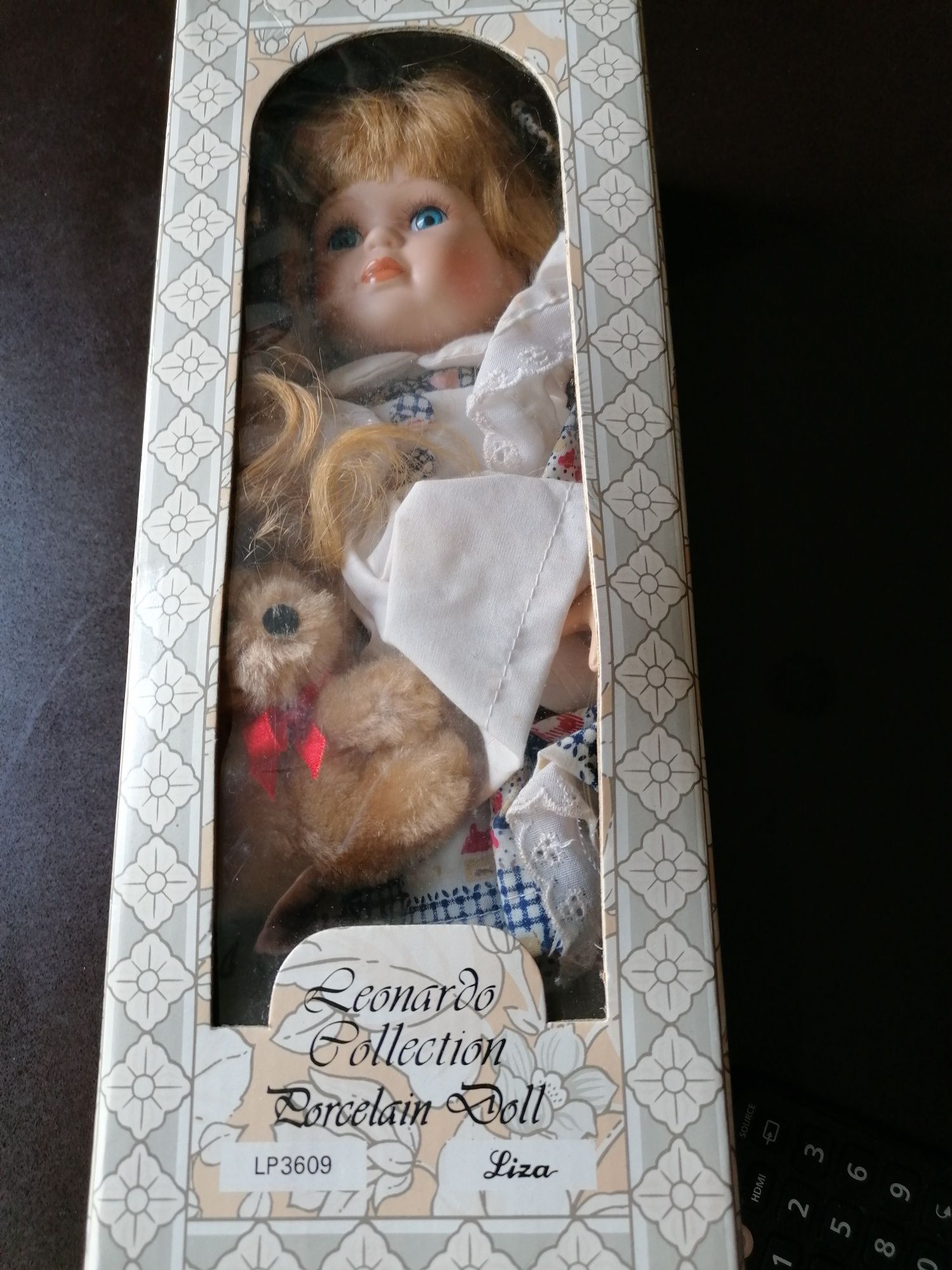 Boneca porcelana