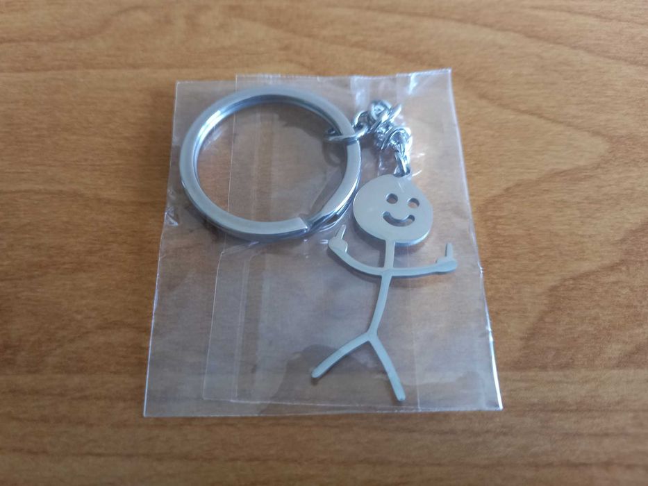 [NOWY] Brelok do kluczy - Ludzik pokazujący środkowy palec [Srebrny]