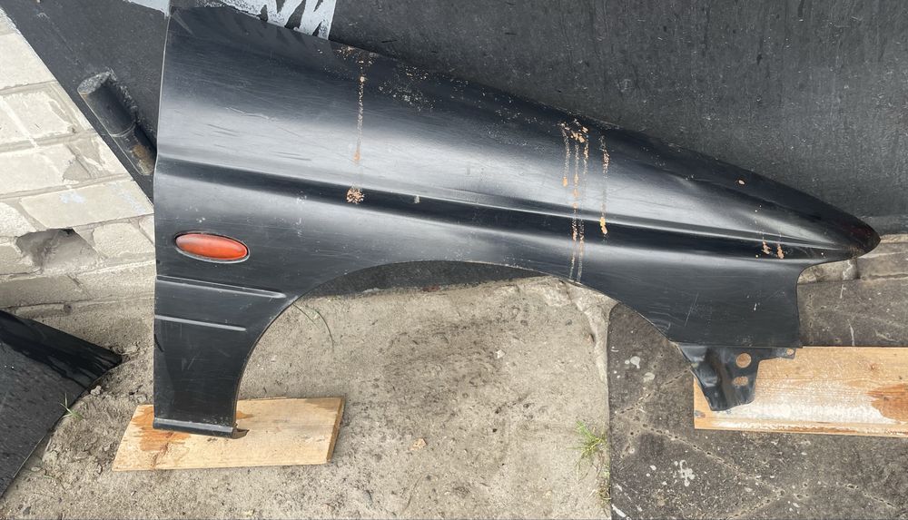 Форд эскорт крыло,дверь стекла от 2 дверного