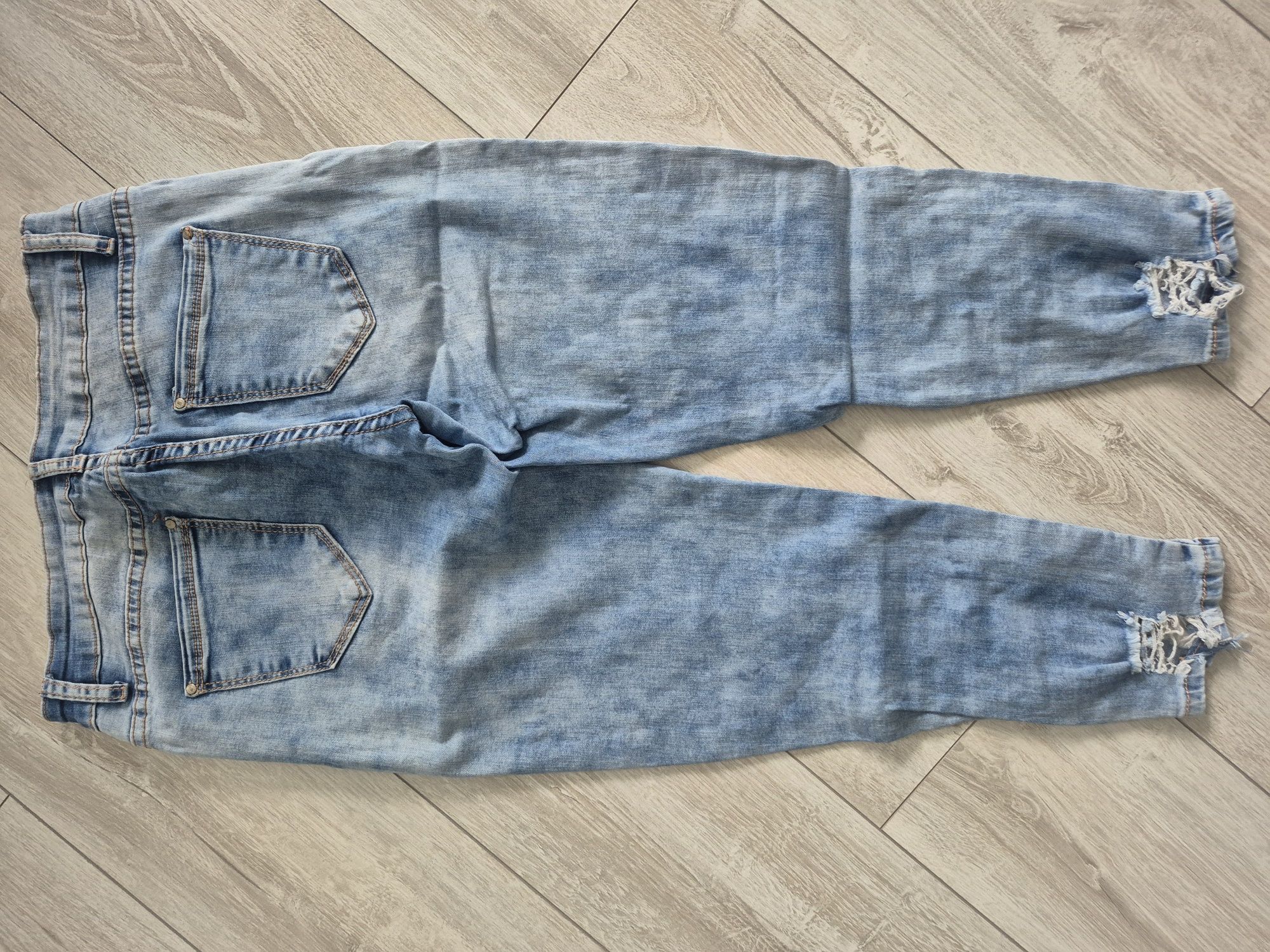 Jeansy z dziurami r. 40/42