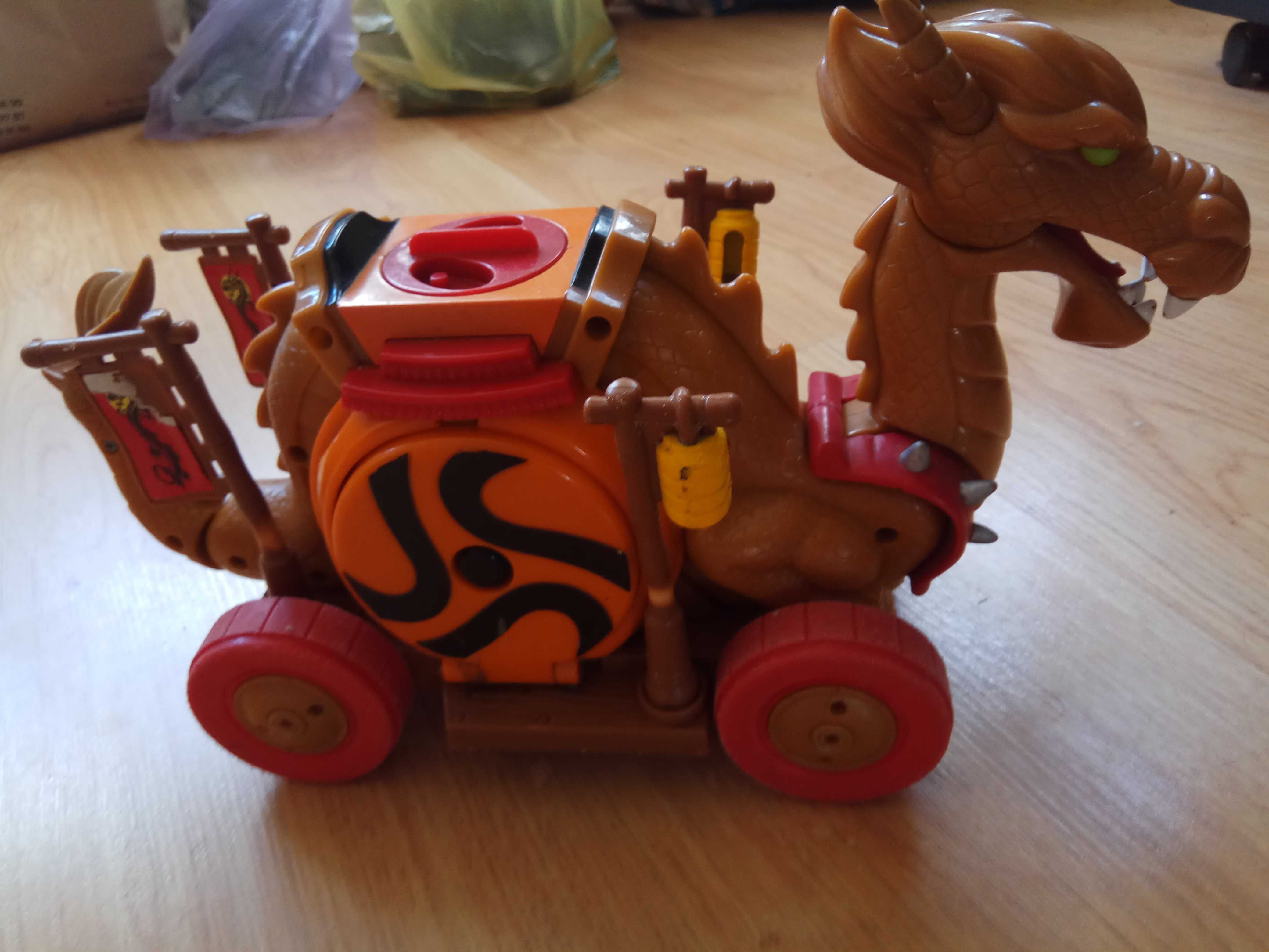 Китайський самурай-дракон на колесах Fisher Price