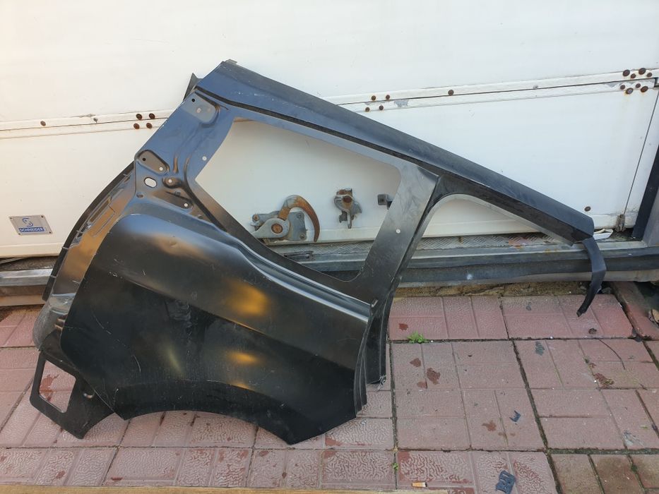 Peugeot 5008 blotnik prawy tył