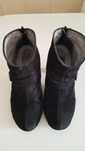 Botas pretas com salto