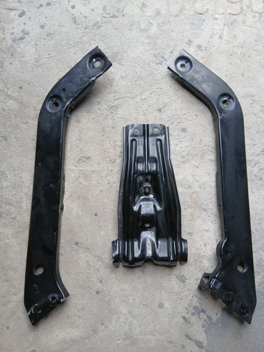 Кронштейны фар и крепление передней панели  Тигуан ll