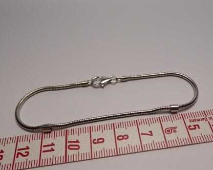 Srebrna bransoletka okrągła linka żyłka z ozdobami 19,5 cm.