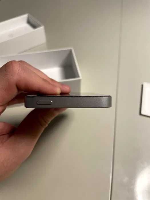 iPhone 5 SE with case and box