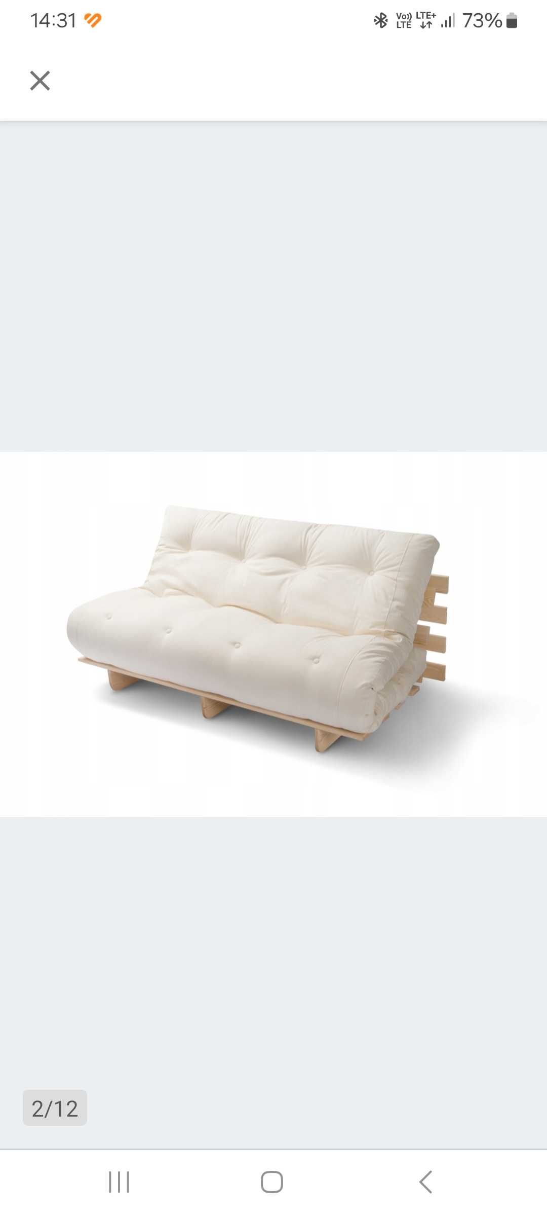 Fotel rozkładany z materacem futon.