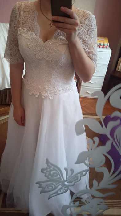 Нові 50 розміру весільні сукні