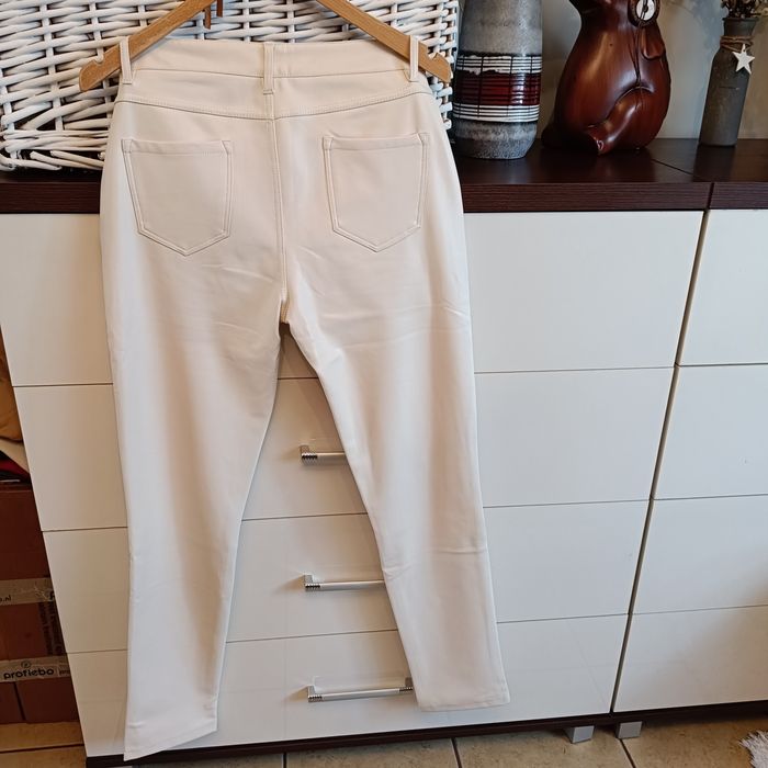 Spodnie ekoskóra śmietankowe