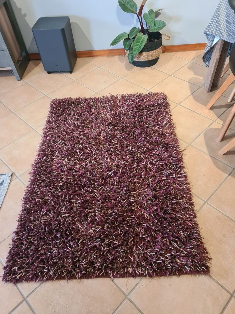 Tapete roxo pelo comprido